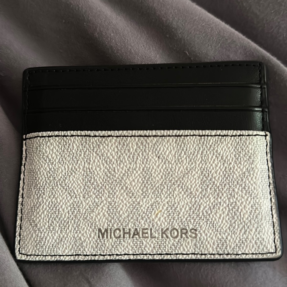 Micheal Kors card case.